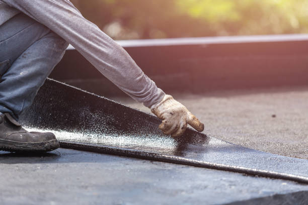 Professional Basement Waterproofing technician working in Laketon, IN